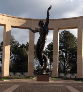 The Spirit of American Youth Rising from the Waves, bronze statue at American cemetery