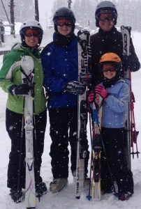 Family in ski gear