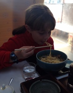 Rachel eating noodles